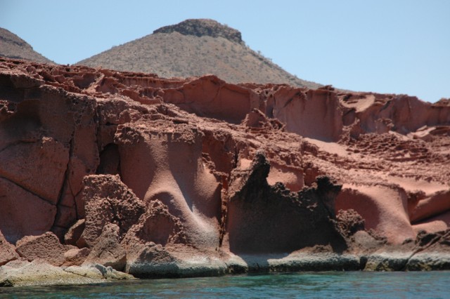 Red_sculpted_Cliffs_Sea_of_Cortez_near_La_Paz_Baja_California_Sur_Mexico